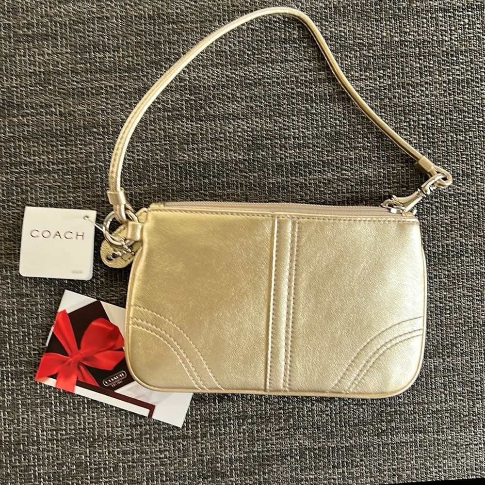 Coach metallic gold leather wristlet